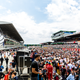 This is the pre-race grid. Only select team members, media, guests, and important fans are allowed here. The post-race invasion is wide open. Imagine how bad that was.
